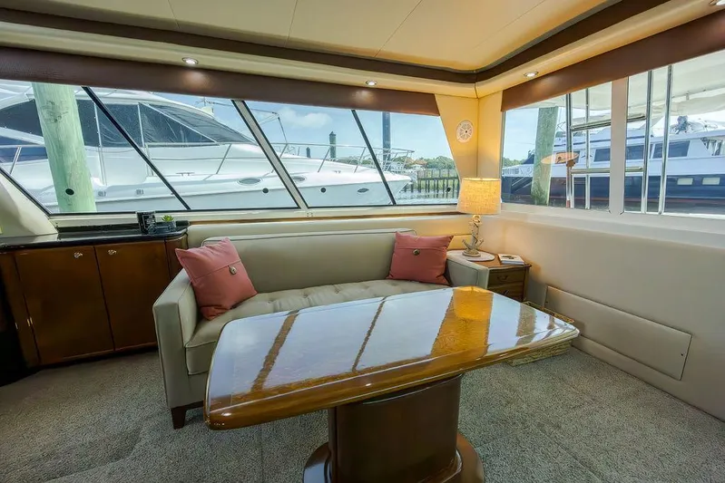  Yacht Photos Pics Luxurious interior of a 2008 Meridian 490 Pilothouse yacht with elegant seating and table.