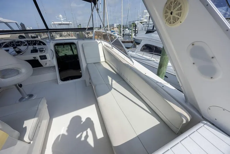  Yacht Photos Pics 2008 Meridian 490 Pilothouse interior with helm, seating, and marina view.