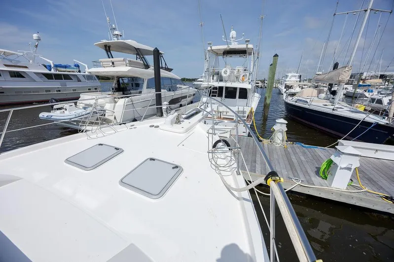  Yacht Photos Pics 2008 Meridian 490 Pilothouse yacht docked at marina, surrounded by other boats.