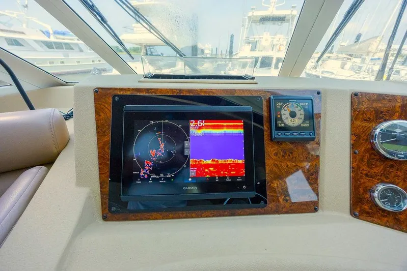  Yacht Photos Pics Dashboard of 2008 Meridian 490 Pilothouse with navigation and radar display.