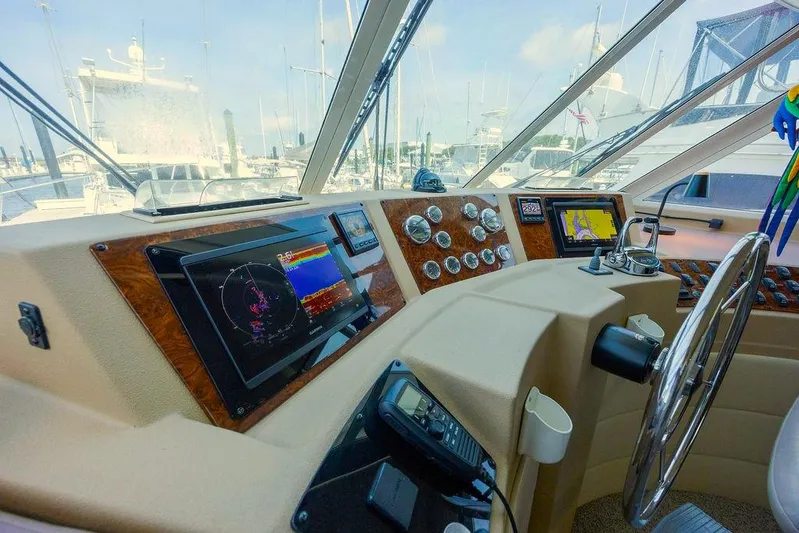  Yacht Photos Pics 2008 Meridian 490 Pilothouse interior with navigation equipment and steering wheel.