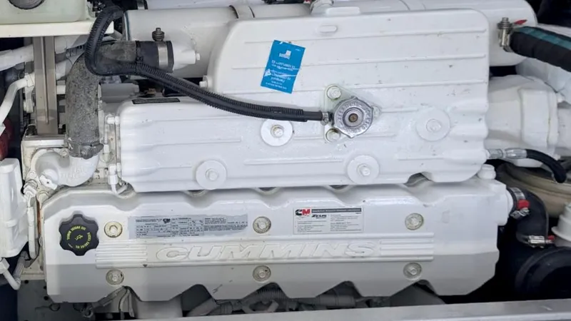  Yacht Photos Pics Cummins engine in a 2012 Sea Ray 450 Sundancer boat, showcasing detailed components.