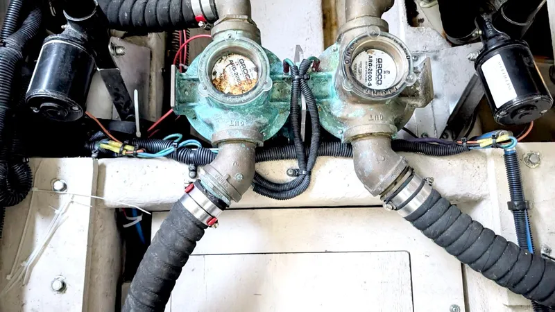  Yacht Photos Pics Engine compartment of 2012 Sea Ray 450 Sundancer with visible hoses and components.