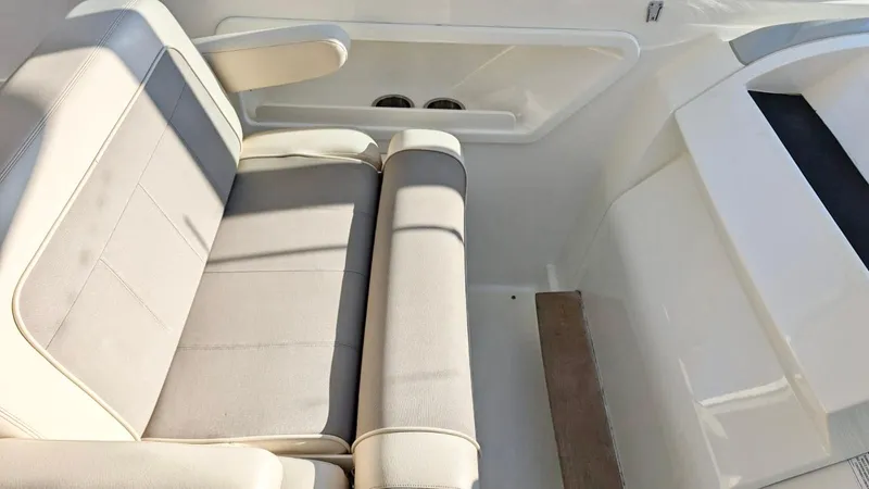  Yacht Photos Pics Interior seating of 2012 Sea Ray 450 Sundancer boat, featuring beige upholstery.