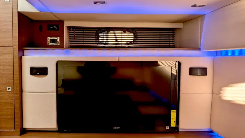  Yacht Photos Pics Interior of 2012 Sea Ray 450 Sundancer with TV and modern lighting.