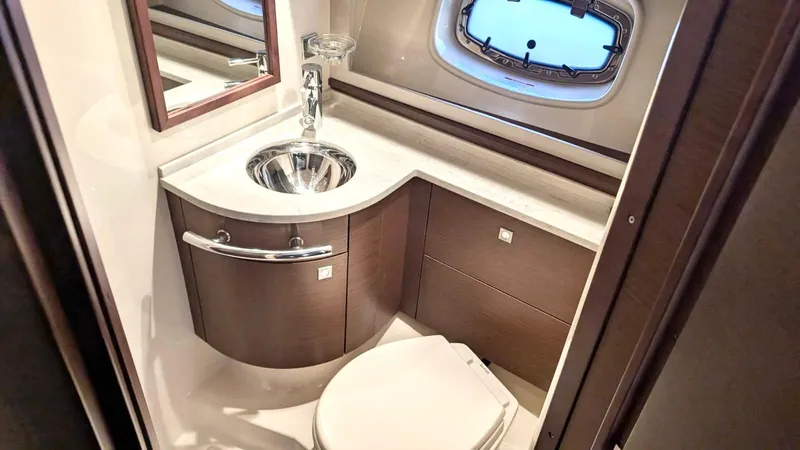  Yacht Photos Pics Luxurious bathroom in 2012 Sea Ray 450 Sundancer yacht with sink and toilet.
