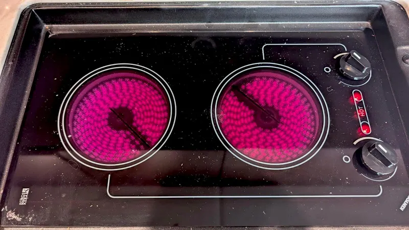  Yacht Photos Pics Electric stove with two glowing burners on a Sea Ray 450 Sundancer yacht, 2012 model.