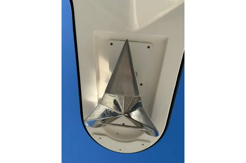  Yacht Photos Pics 2015 Pursuit OS 385 Offshore boat anchor detail against blue sky.