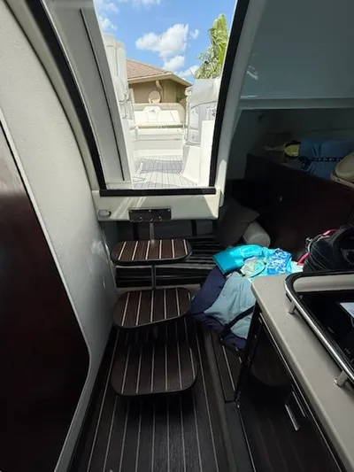  Yacht Photos Pics Interior view of 2019 Monterey 295 Sport Yacht with steps and cabin area.