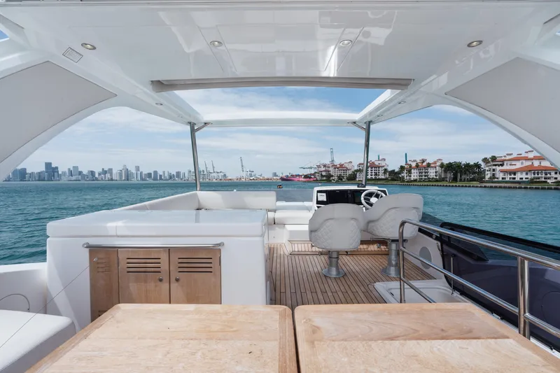 Why Knot Yacht Photos Pics Luxury Sunseeker 52 Manhattan yacht interior, 2020 model, with ocean view and modern design.