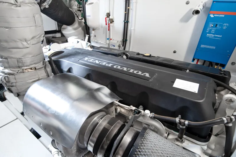 Why Knot Yacht Photos Pics Engine room of 2020 Sunseeker 52 Manhattan yacht featuring Volvo Penta engine.