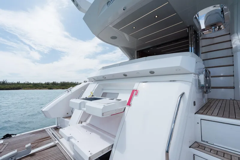 Why Knot Yacht Photos Pics Sunseeker 52 Manhattan 2020 yacht with sleek design and luxurious deck features.