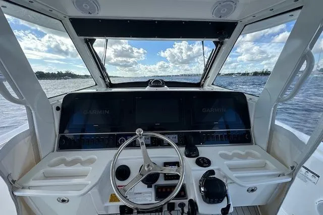  Yacht Photos Pics Cockpit view of 2016 Everglades 435 Center Console boat with Garmin navigation system.