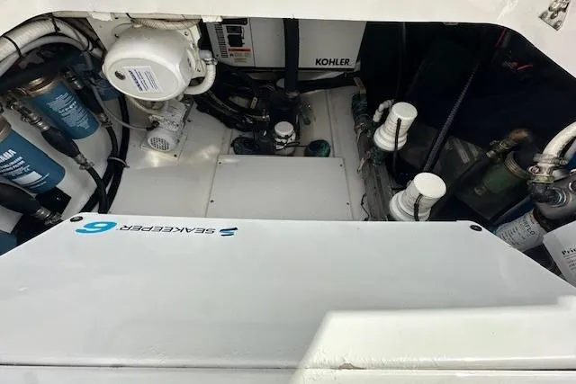  Yacht Photos Pics Engine compartment of 2016 Everglades 435 Center Console with Kohler generator and Seakeeper system.