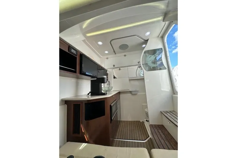  Yacht Photos Pics Interior of 2016 Everglades 435 Center Console boat with modern amenities and sleek design.