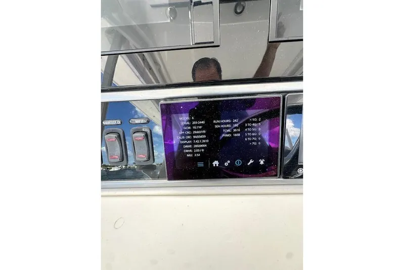  Yacht Photos Pics Control panel of a 2016 Everglades 435 Center Console boat displaying engine data.