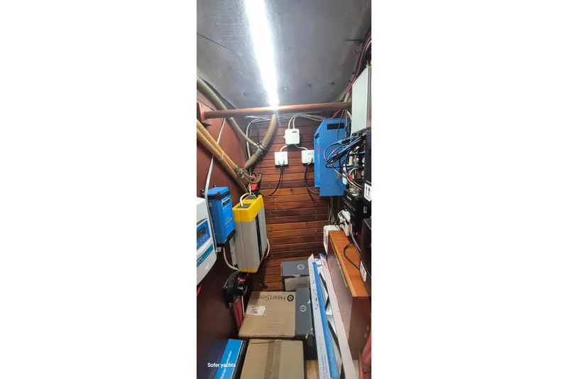  Yacht Photos Pics Electrical system setup inside a 1986 Hallberg-Rassy 49 yacht, featuring various equipment and wiring.