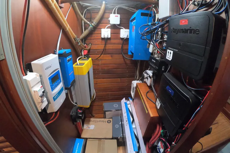  Yacht Photos Pics Electrical system setup in a 1986 Hallberg-Rassy 49 yacht, featuring various marine electronics.