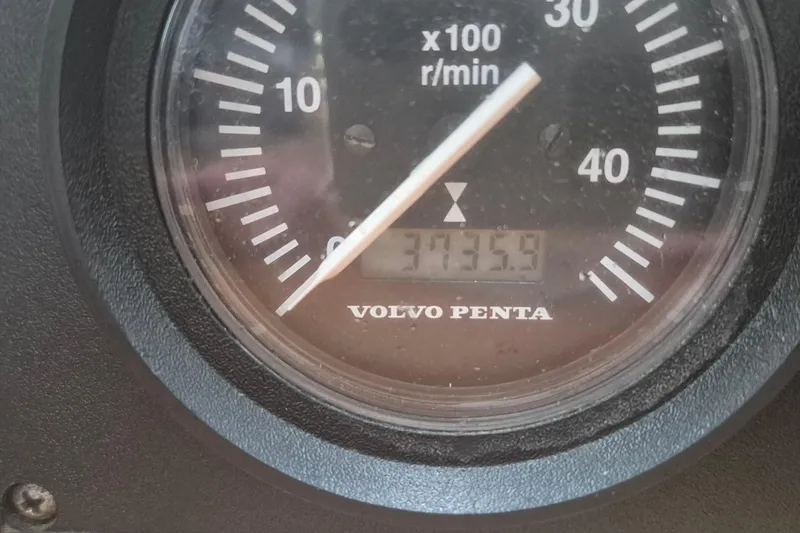  Yacht Photos Pics Volvo Penta tachometer displaying 3735.9 hours on a 1986 Hallberg-Rassy 49.