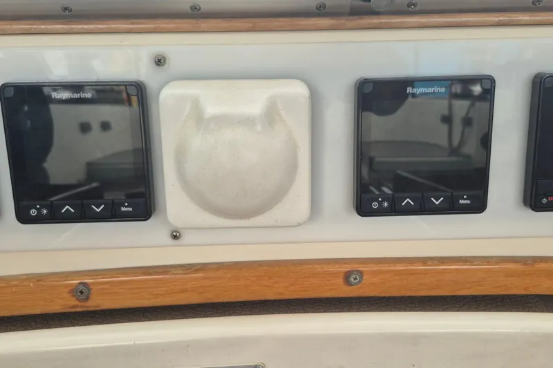  Yacht Photos Pics Control panel of a 1986 Hallberg-Rassy 49 yacht with Raymarine displays.