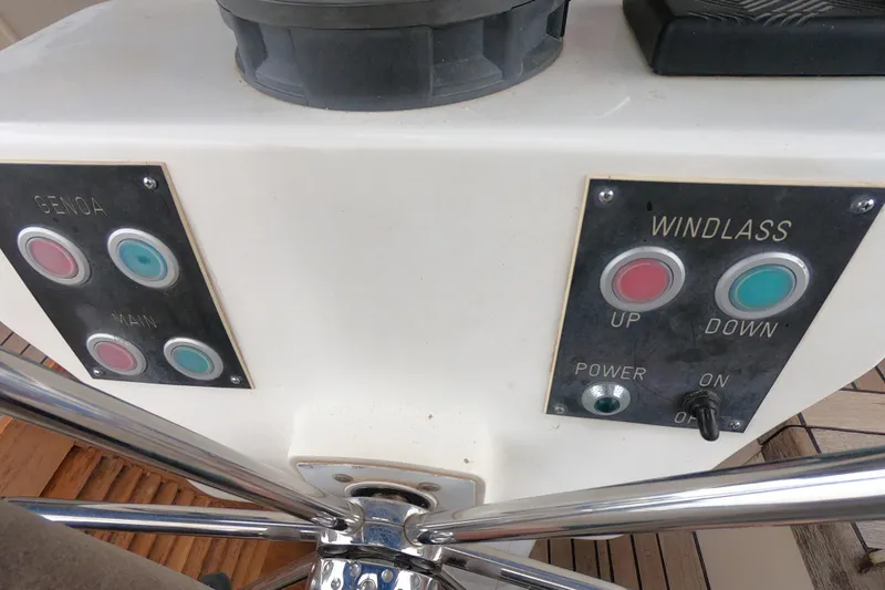  Yacht Photos Pics Control panel of a 1986 Hallberg-Rassy 49 sailboat with windlass and genoa buttons.