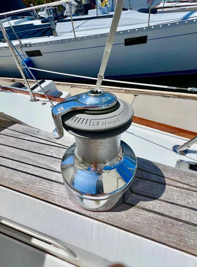 Vela Dare II Yacht Photos Pics Winch on deck of 1999 Sabre 402 sailboat in marina.