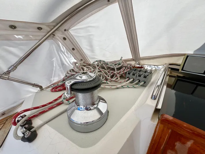 Vela Dare II Yacht Photos Pics Sailing yacht Sabre 402 (1999) winch and rope setup in cockpit.