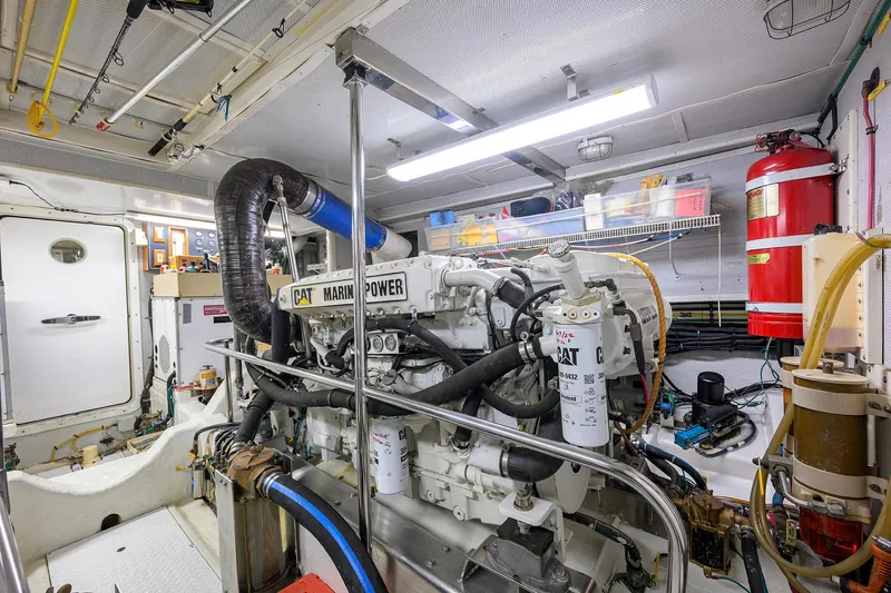 Change Of Latitude Yacht Photos Pics Engine room of 2001 Ocean Alexander 602 yacht with CAT marine power engine.