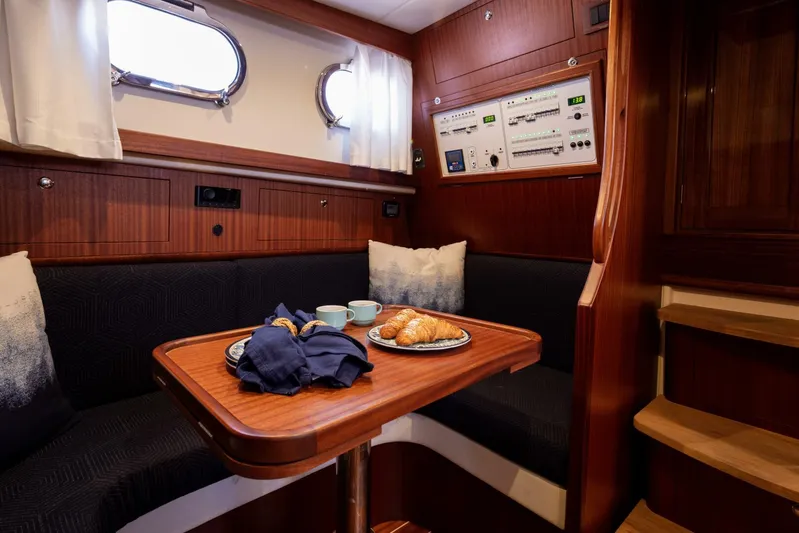  Yacht Photos Pics Fratelli Aprea 32 Hard Top 2022 interior with dining area and control panel.