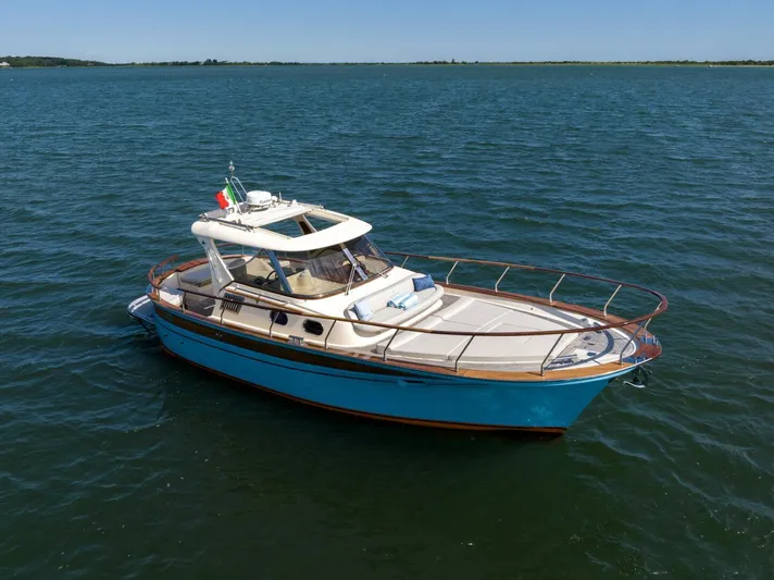  Yacht Photos Pics 2022 Fratelli Aprea 32 Hard Top boat on calm blue water.