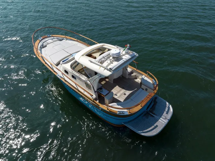  Yacht Photos Pics 2022 Fratelli Aprea 32 Hard Top yacht cruising on open water.