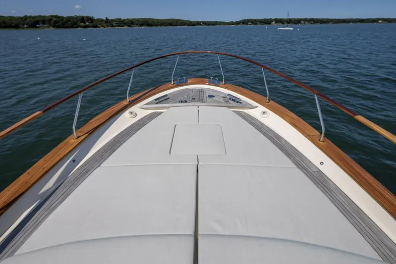  Yacht Photos Pics Fratelli Aprea 32 Hard Top 2022 yacht on calm waters, showcasing sleek deck design.