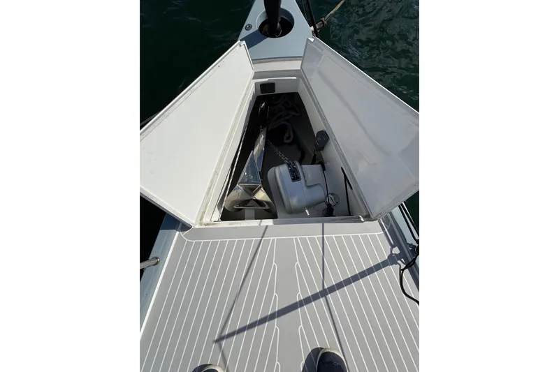 Sortie Yacht Photos Pics Open storage compartment on 2023 Saffier 33 Life sailboat deck, showing anchor and equipment.