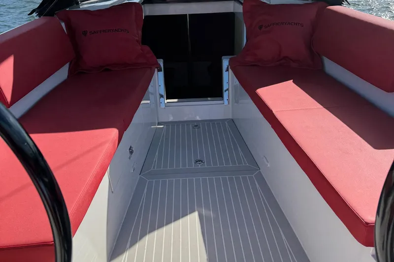 Sortie Yacht Photos Pics Red-cushioned seating on 2023 Saffier 33 Life yacht, featuring sleek interior design.