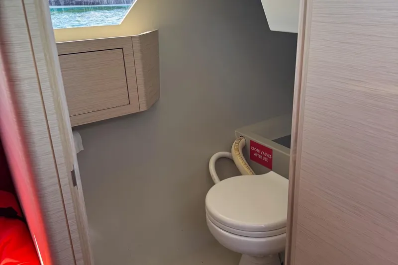 Sortie Yacht Photos Pics 2023 Saffier 33 Life yacht interior bathroom with modern design and compact toilet.