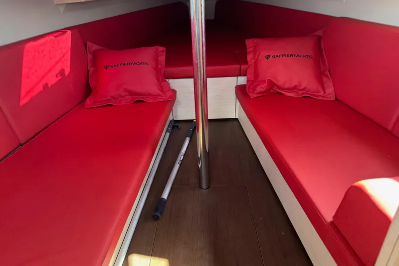 Sortie Yacht Photos Pics Red interior seating of 2023 Saffier 33 Life yacht with branded cushions.