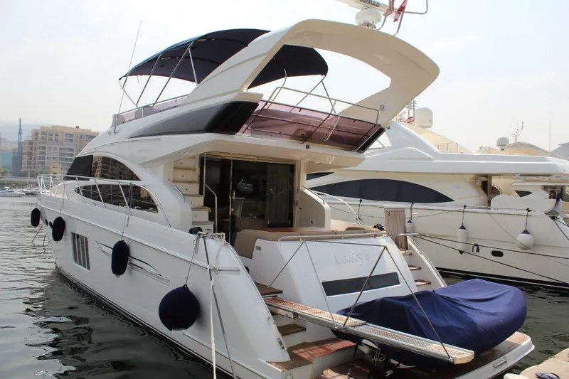  Yacht Photos Pics Luxury yacht Princess 64, 2013 model, docked in harbor.