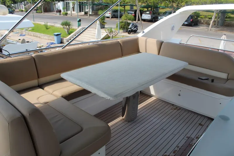  Yacht Photos Pics Luxurious seating area on a 2013 Princess 64 yacht.