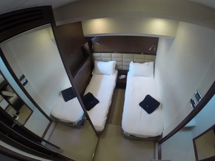  Yacht Photos Pics 2013 Princess 64 yacht cabin with twin beds.