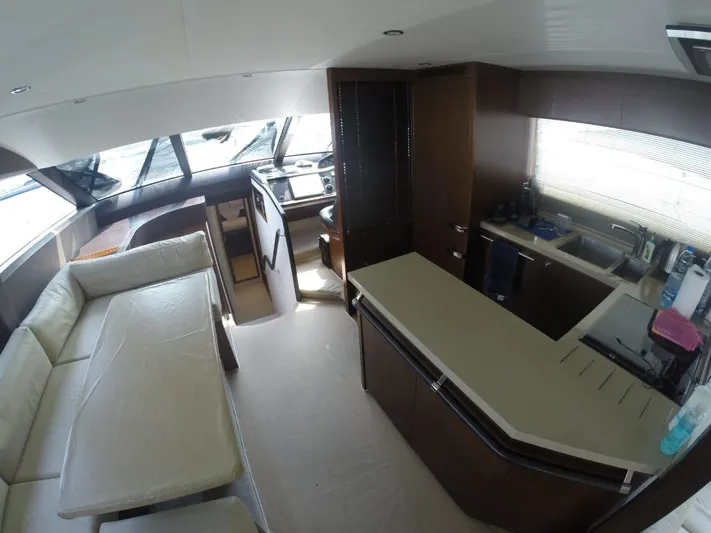 Yacht Photos Pics Interior of a 2013 Princess 64 yacht with modern kitchen.