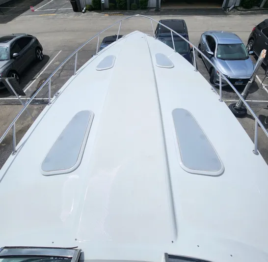 Reduced! Yacht Photos Pics 2005 Formula 400 Super Sport boat deck view in parking lot.