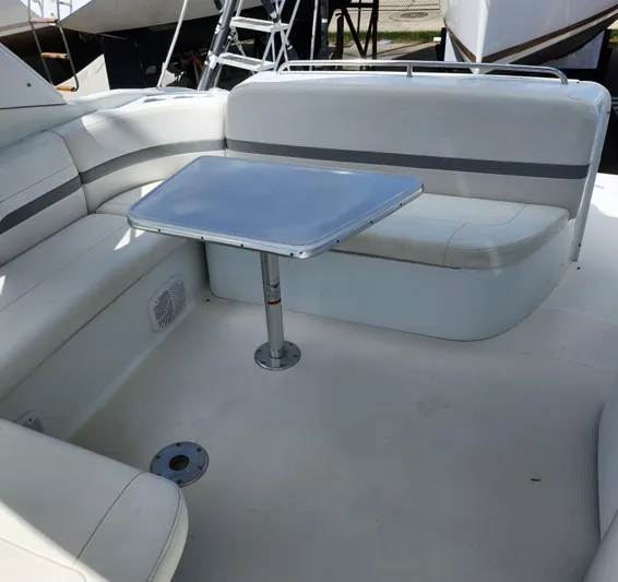 Reduced! Yacht Photos Pics 2005 Formula 400 Super Sport boat interior with seating and table.