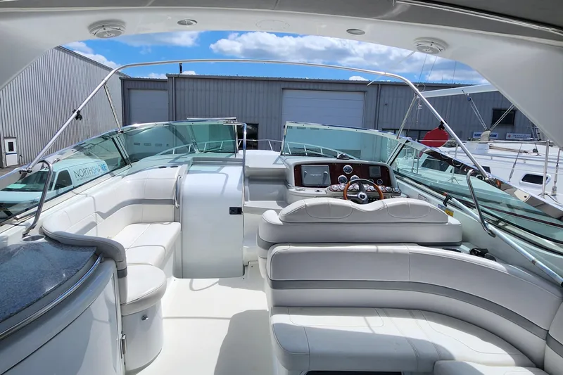 Reduced! Yacht Photos Pics 2005 Formula 400 Super Sport boat interior with luxurious seating and modern dashboard.