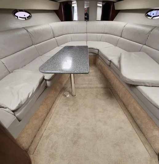 Reduced! Yacht Photos Pics 2005 Formula 400 Super Sport interior with plush seating and sleek table.