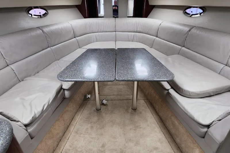 Reduced! Yacht Photos Pics Interior of 2005 Formula 400 Super Sport with gray seating and dual tables.