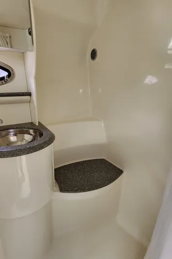 Reduced! Yacht Photos Pics 2005 Formula 400 Super Sport boat interior with sink and seating area.