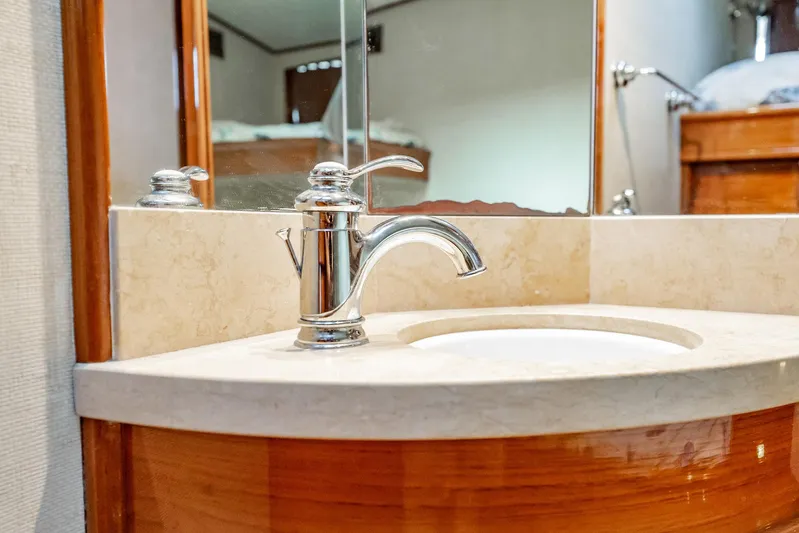 Lucky Yacht Photos Pics Luxurious bathroom sink in 1983 Rybovich 55 Convertible yacht.