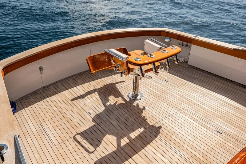 Lucky Yacht Photos Pics 1983 Rybovich 55 Convertible yacht deck with fishing chair, overlooking the ocean.