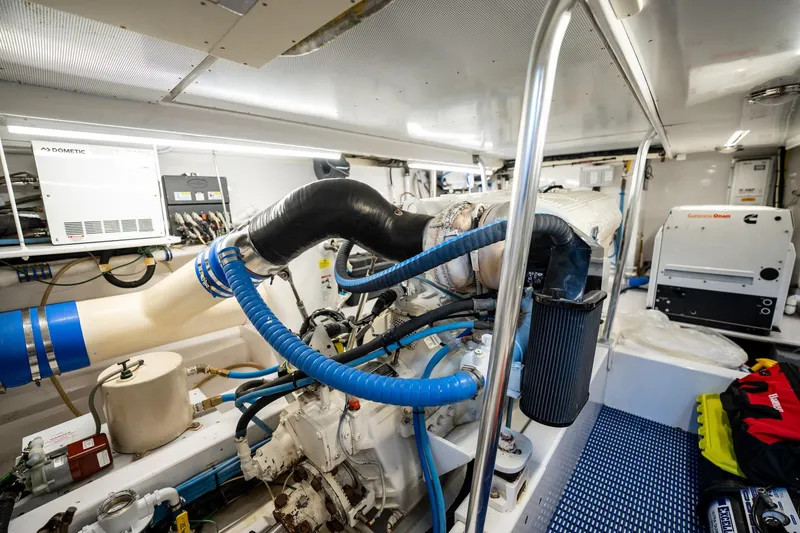 Lucky Yacht Photos Pics Engine room of 1983 Rybovich 55 Convertible yacht with visible machinery and equipment.