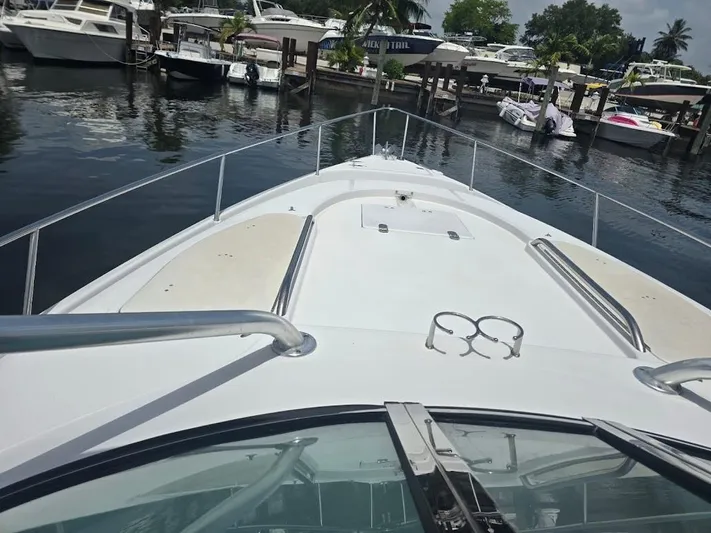  Yacht Photos Pics 2008 Donzi 38 ZSF boat docked at marina, view from bow.